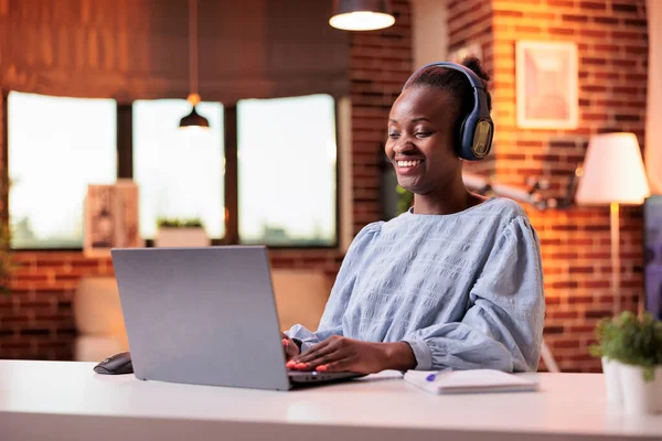 Female Student Headphones Listening Tutorial Laptop Home Smiling African American — Foto de Stock