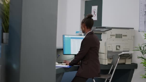 Medical Worker Answering Landline Phone Call Reception Desk Counter Having — стоковое видео