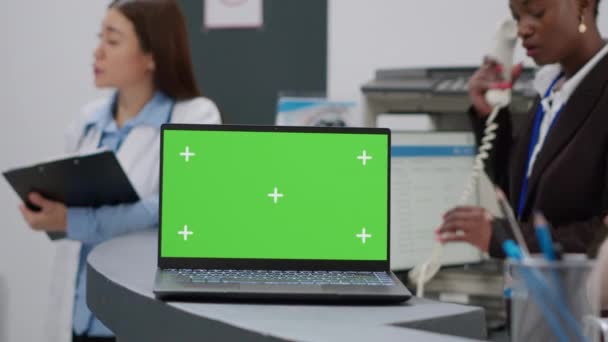 Laptop Greenscreen Template Hospital Reception Counter Medical Team Working Isolated — Wideo stockowe