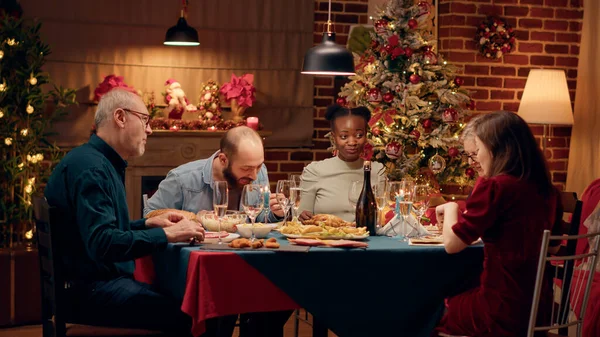 Happy Diverse Family Members Enjoying Traditional Home Cooked Food Wihle — Stockfoto