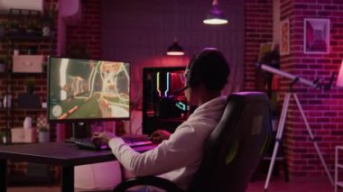 Man streaming online multiplayer first person shooter surprised after losing online competition on gaming pc. African american gamer cannot believe failing level in first action game tournament.