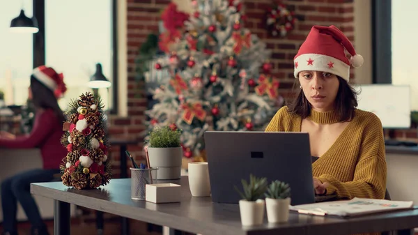 Young Adult Wearing Santa Hat Working Laptop Sending Email Report — Stock Photo, Image