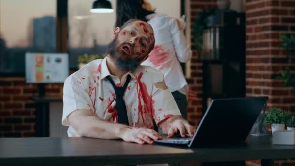 Bizarre Looking Zombie Using Modern Laptop Office Workspace Evil Apocalyptic — Wideo stockowe