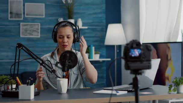Social Media Influencer Putting Headphones While Filming Vlog Cheerful Digital — Stockvideo