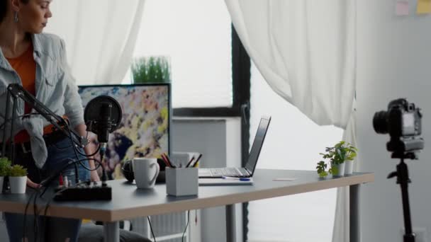Attractive Vlogger Sitting Studio Desk While Starting Recording Video Popular — Vídeos de Stock