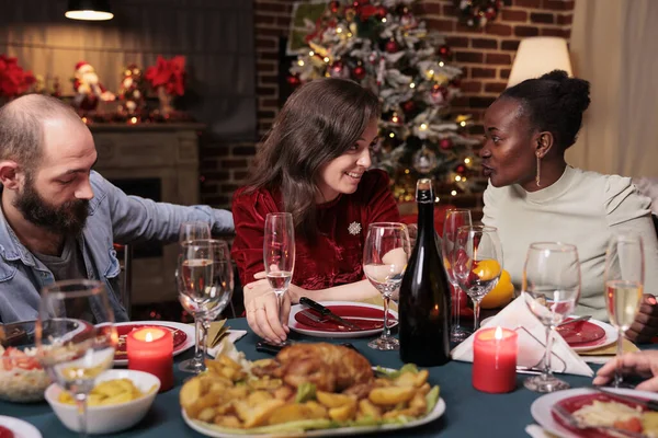 Friends Celebrating Christmas Couple Talking African American Woman Festive Dinner — Stock Photo, Image