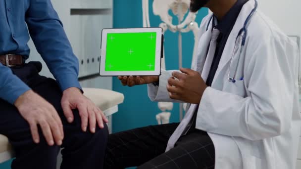 Specialist Showing Horizontal Greenscreen Tablet Senior Patient Looking Chromakey Display — Stock video