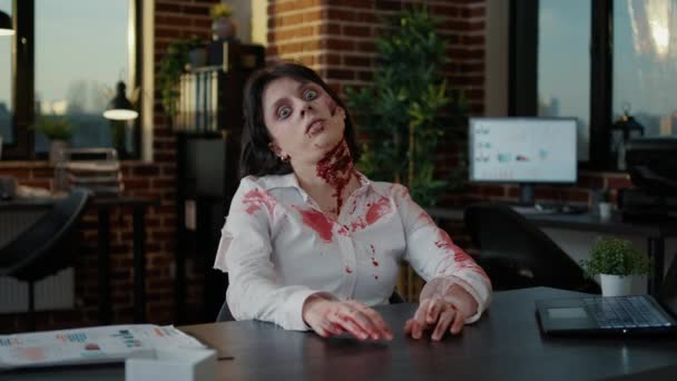 Scary Looking Office Zombie Deep Bloody Scars Sitting Table While — Vídeo de Stock
