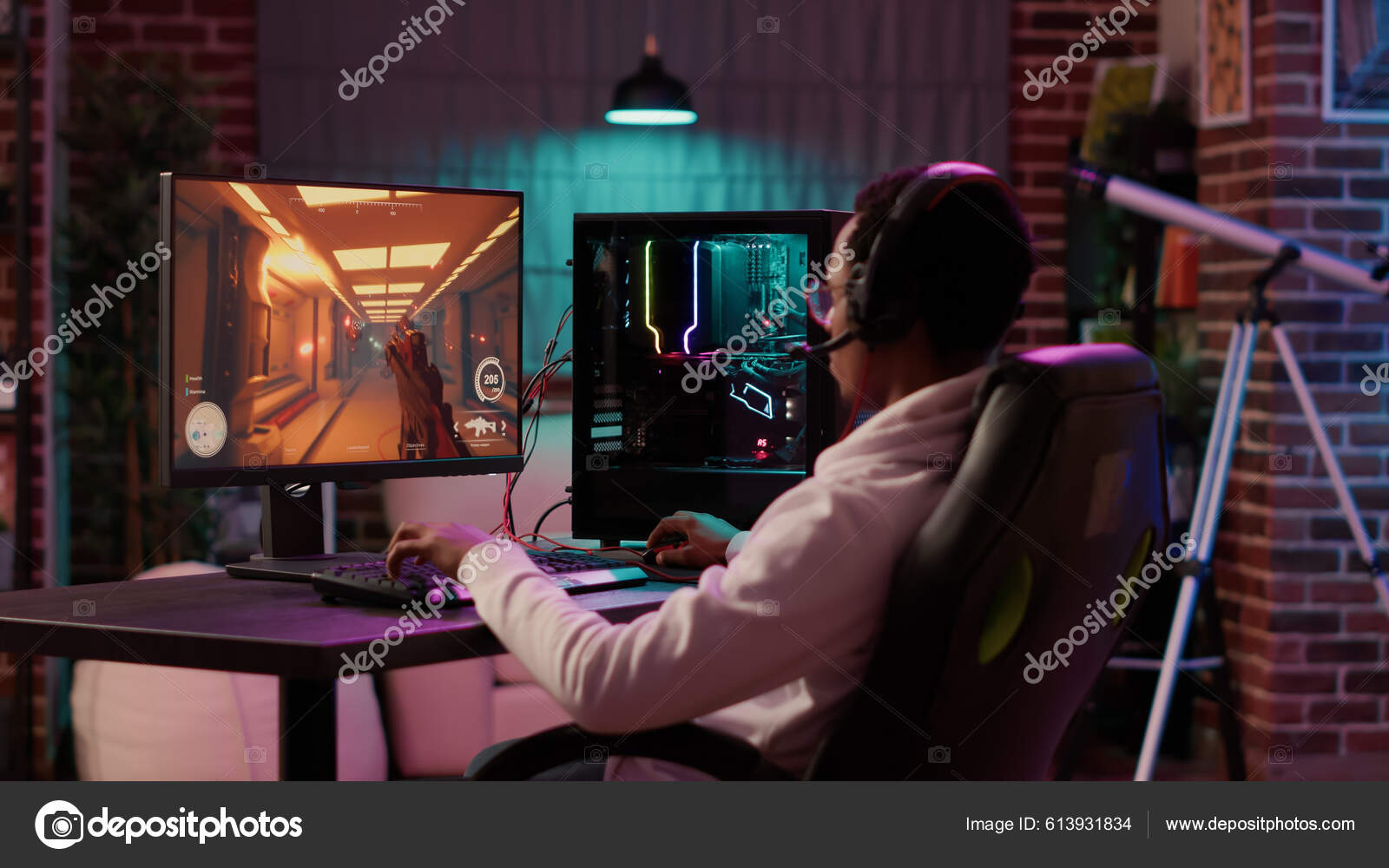 Free Photo  Gamer using controller to play online video games on computer.  man playing game with joystick and headphones in front of monitor. player  having gaming equipment, doing fun activity.