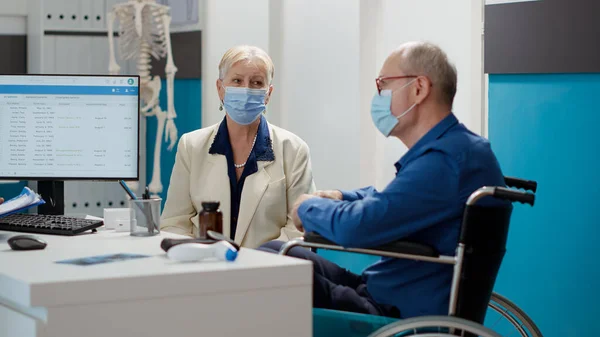 Elderly Man Disability Wife Having Medical Appointment Cabinet Physician Patient — Stockfoto