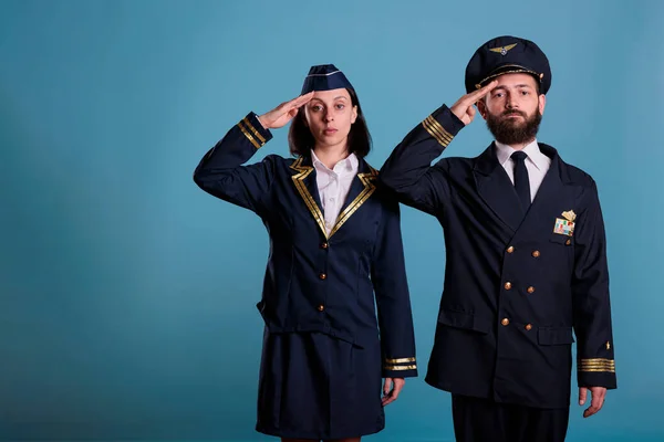 Airplane Captain Stewardess Saluting Portrait Aircraft Crew Professional Flight Uniform — Stock Photo, Image