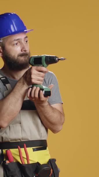 Vertical Video Portrait Repairman Builder Using Electric Power Drill Machine — Stock Video