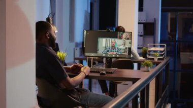 Manager using videocall teleconference to talk to people on online conference meeting with webcam. Chatting with colleagues on remote videoconference, with online internet call.