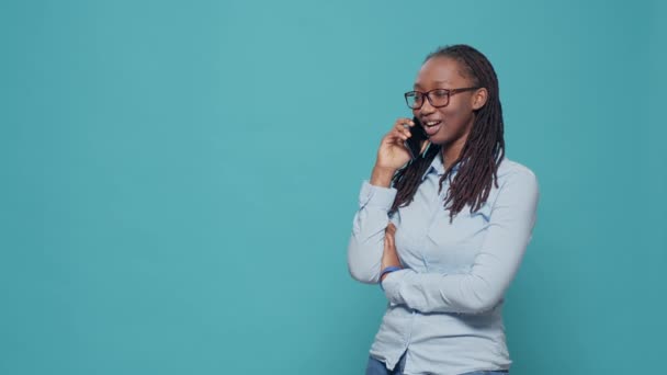 African American Woman Talking Telephone Line Answering Phone Call Blue — Vídeos de Stock