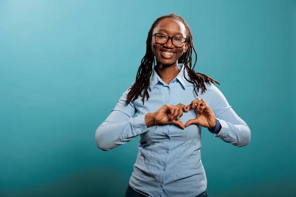 Happy Joyful Smiling Heartily Woman Making Heart Symbol Hands While — 图库照片