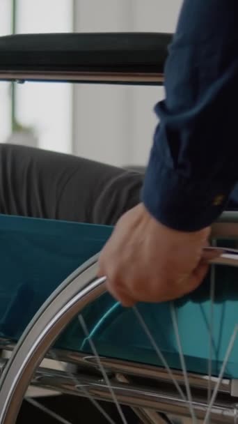 Video Vertical Close Independence Handicapped Man Wheelchair Entering Company Office — Stock Video