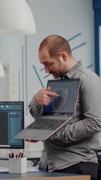 Man Project Supervisor Holding Laptop Pointing Display Showing Woman Industrial — Stock Video