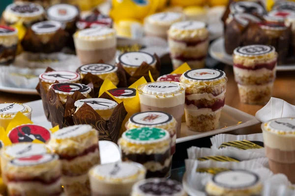 cakes sweets on the catering table, candy bar for guests in the restaurant