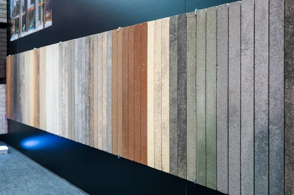 Samples of tiles for cladding in a hardware store, finishing materials for construction