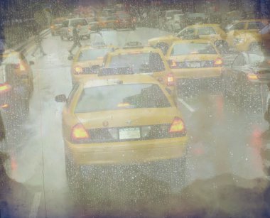 Manhattan taxi cabs during rain clipart