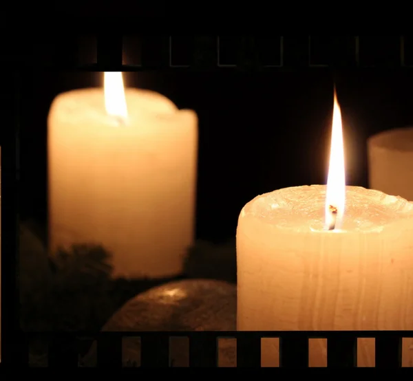 フィルム ストリップや蝋燭の光 — ストック写真