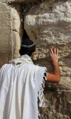 Jewish worshiper pray at the Wailing Wall an important jewish religious site in Jerusalem, Israel.