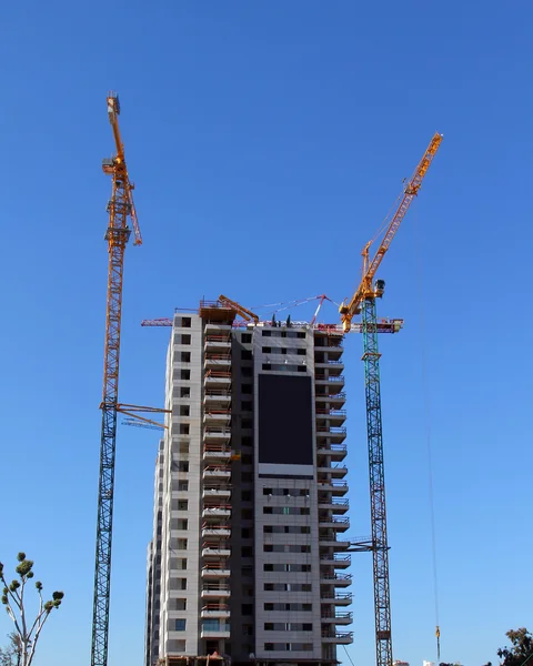 Construction site and cranes — Stock Photo, Image