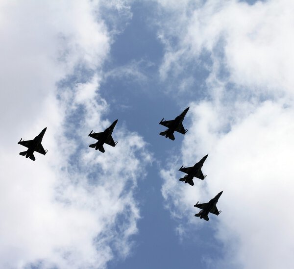 Israeli Air Force airplanes (five jet fighters) at parade in honor of Independence Day . Tel Aviv, Israel