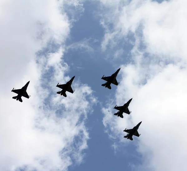 Israeli Air Force airplanes (five jet fighters) at parade in honor of Independence Day . Tel Aviv, Israel — Stock Image Israeli Air Force airplanes (five jet fighters) at parade in honor of Independence Day . Tel Aviv, Israel Royalty Free Stock Images