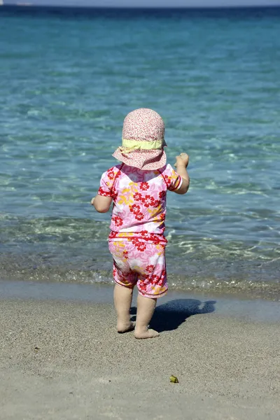 Little cute blond girl at the port in Porto Cervo. Sardinia — Stock Photo, Image