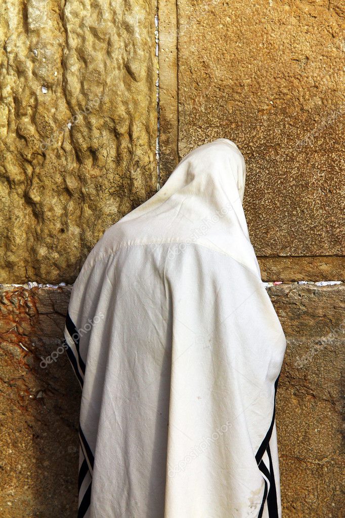 Jewish worshiper prays at the Wailing Wall