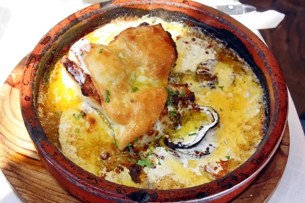 Traditional Spanish soup with fish and oysters — Stock Photo, Image