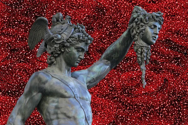 Perseus holding the head of Medusa on red abstract background,Florence — Stock Photo, Image