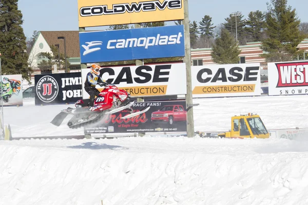 Polaris Red & Black Snowmobile Flying Fast — Stock Photo, Image