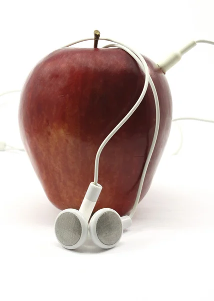 Πράσινο μήλο με ακουστικά — Φωτογραφία Αρχείου