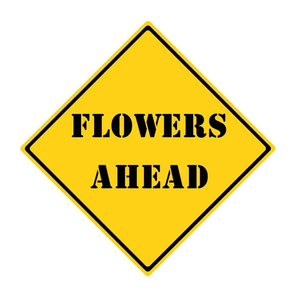 Blumen vor dem Schild — Stockfoto
