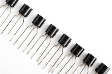 Row of electronic jfet on white background clipart