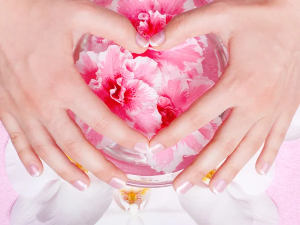 Red manicure with flowers — Stock Photo, Image