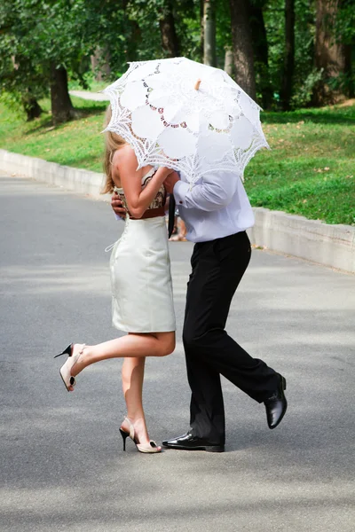 Love couple under an umbrella — Stock Photo, Image