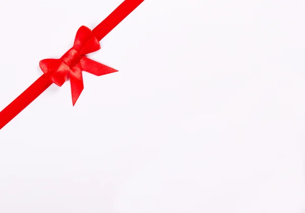 Red ribbon bow on white background — Stock Photo, Image