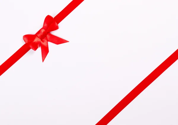 Red ribbon bow on white background — Stock Photo, Image