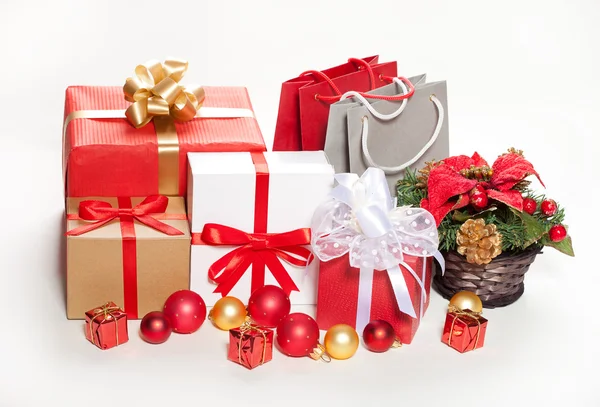 Christmas gifts and decorations on a white background — Stock Photo, Image