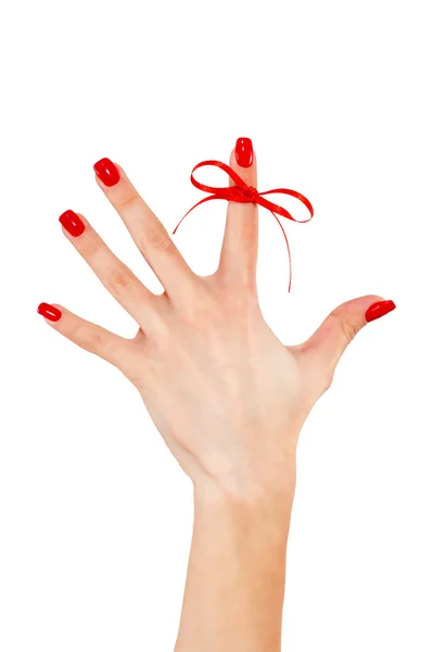 Red bow on finger, concepts sclerosis — Stock Photo, Image