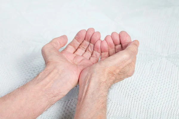 The hands of the old man. Stock Picture