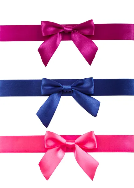 Colored ribbons with bows on white background. — Stock Photo, Image