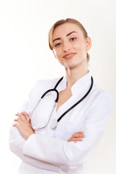 Retrato de una hermosa doctora con un estetoscopio . — Foto de Stock