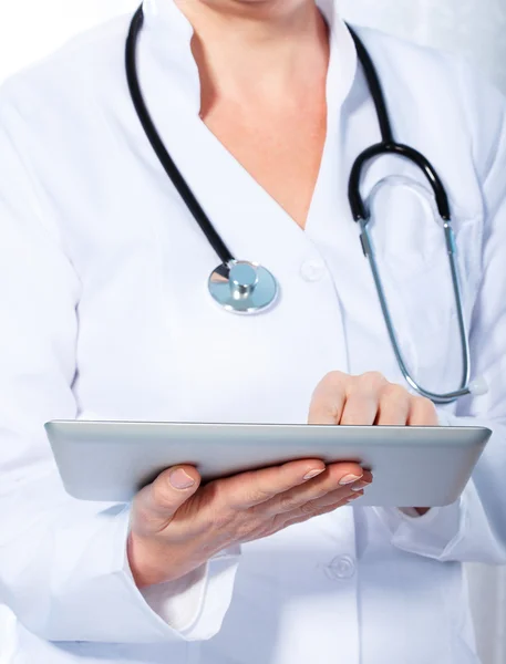 Doctor working with tablet, Stock Photo