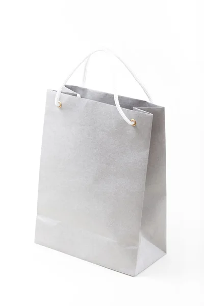Бумажный мешок на белом фоне — стоковое фото