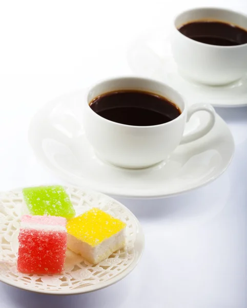 Fincan kahve ve tatlılar — Stok fotoğraf