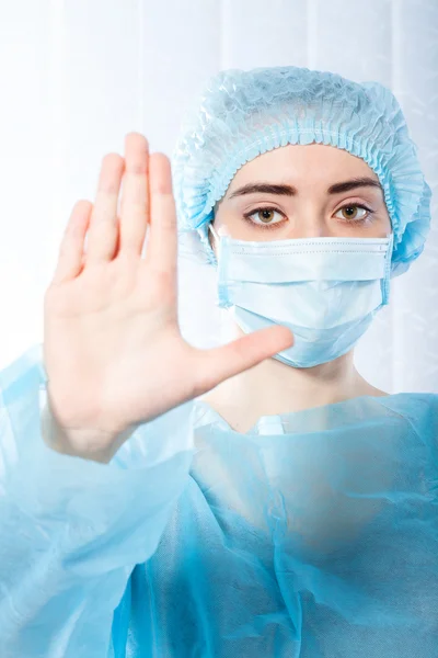 Portrait female doctor shows stop his hand — Stock Photo, Image